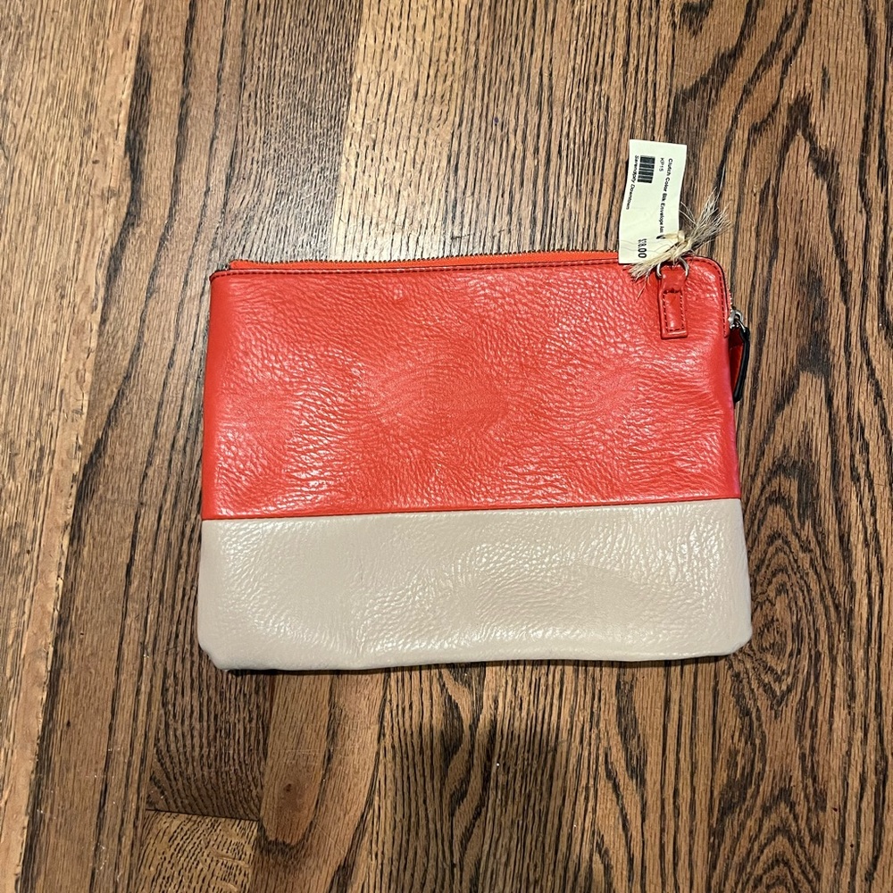 Two toned leather clutch. New! Never used!